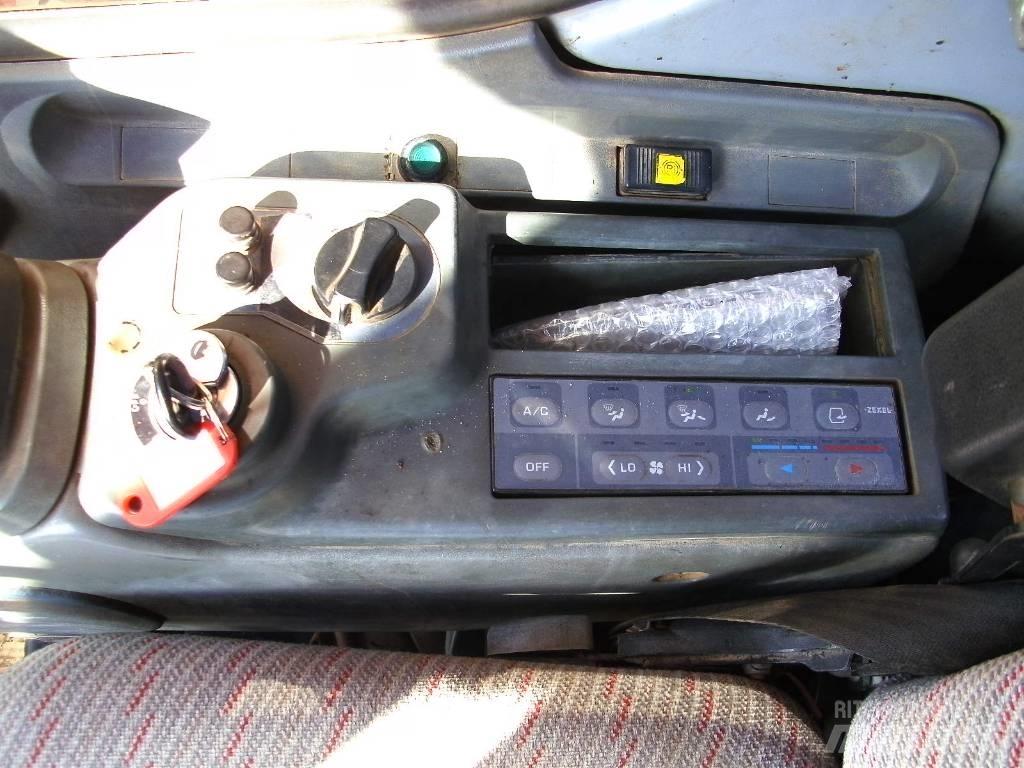 Fiat-Kobelco EX215W Колёсные экскаваторы