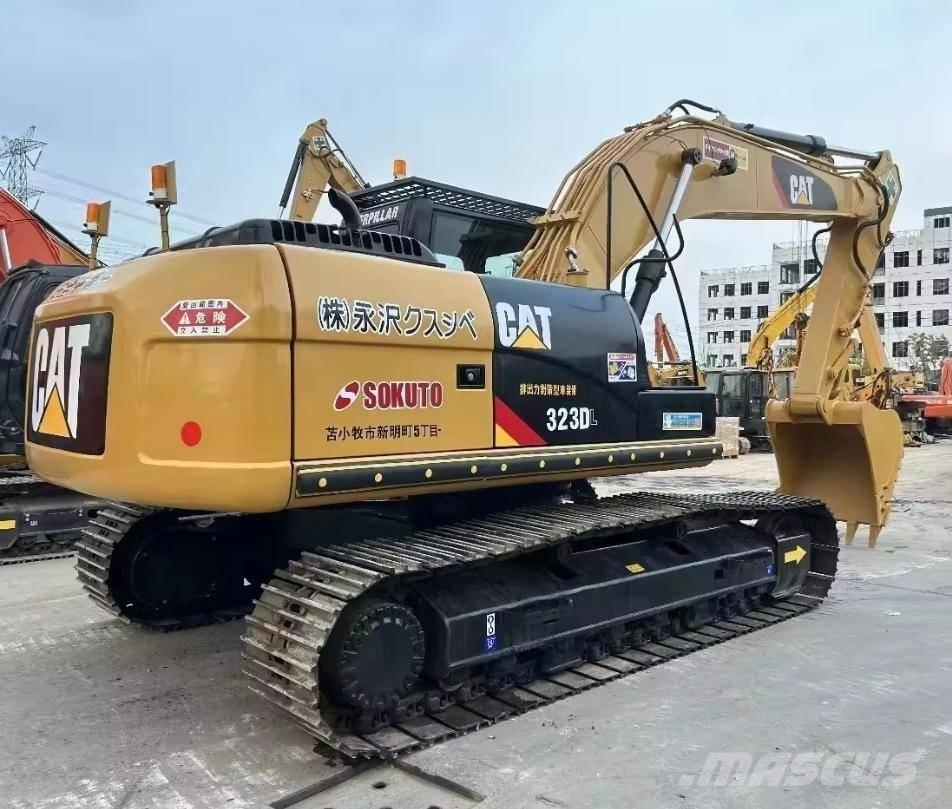 CAT 323 D Гусеничные экскаваторы