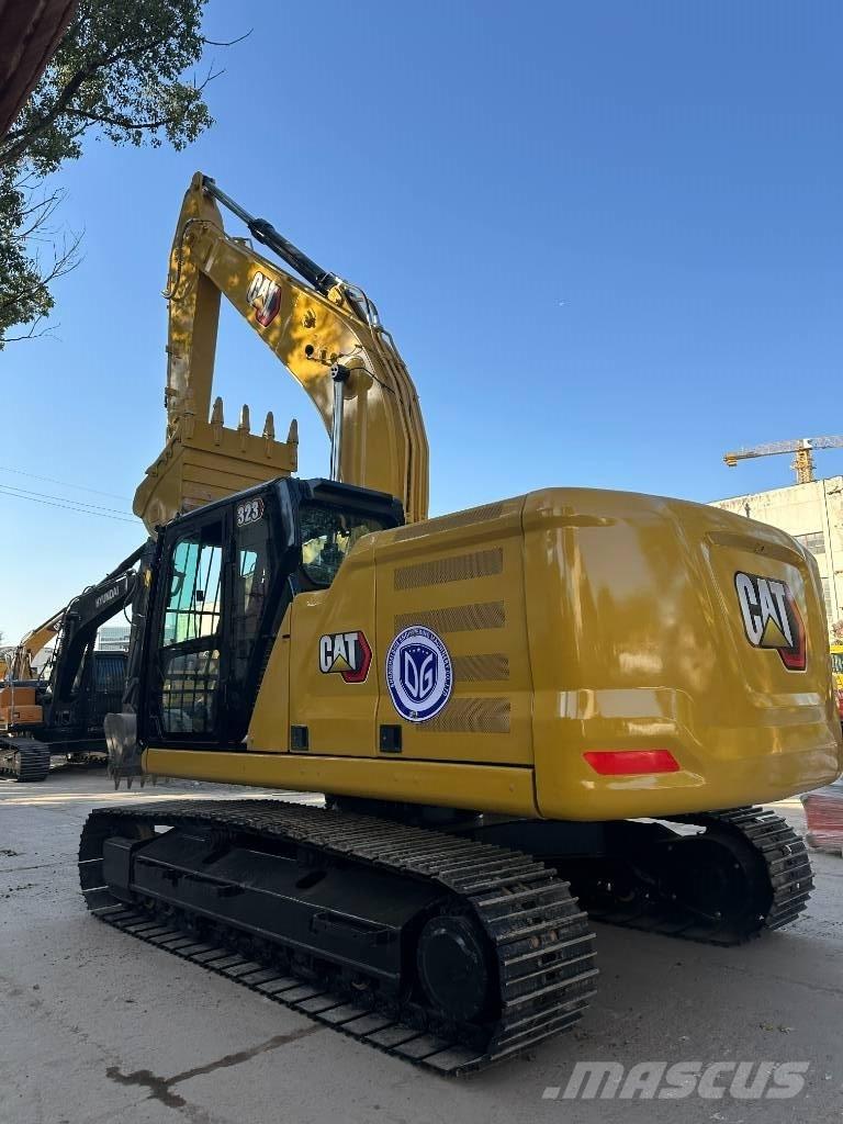 CAT 323 Малые экскаваторы 7т-12т