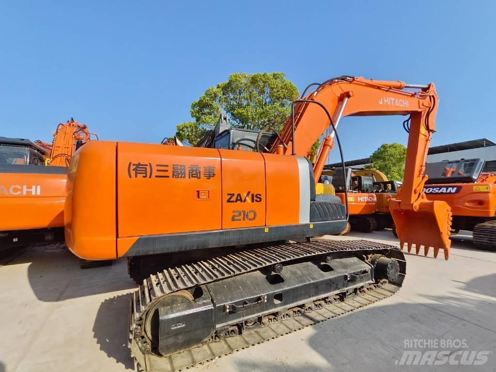 Hitachi ZX 210 Гусеничные экскаваторы