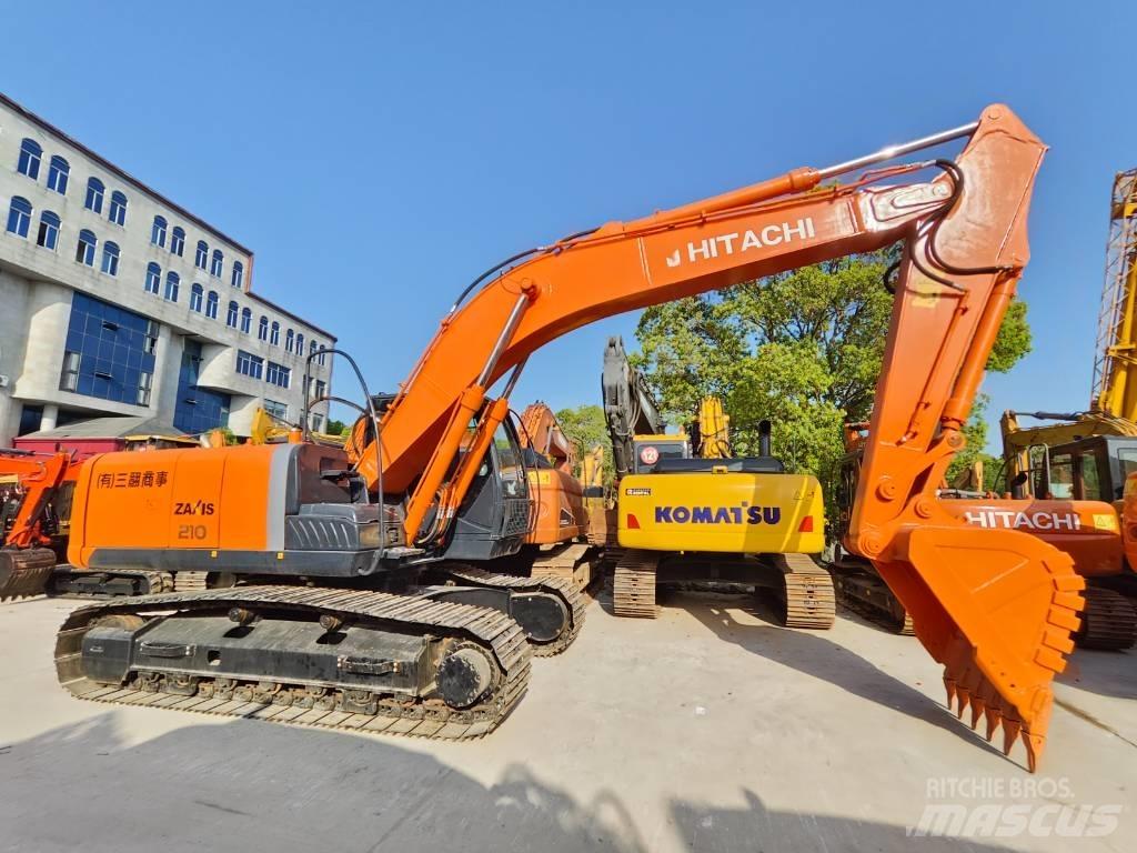 Hitachi ZX 210 Гусеничные экскаваторы