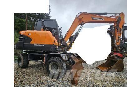 Doosan DX65W Колёсные экскаваторы
