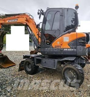 Doosan DX65W Колёсные экскаваторы