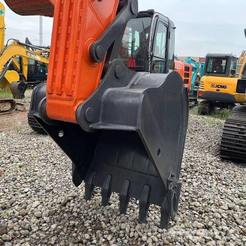 Doosan DX 225 Гусеничные экскаваторы