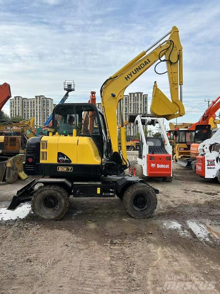 Hyundai R60-7 Колёсные экскаваторы
