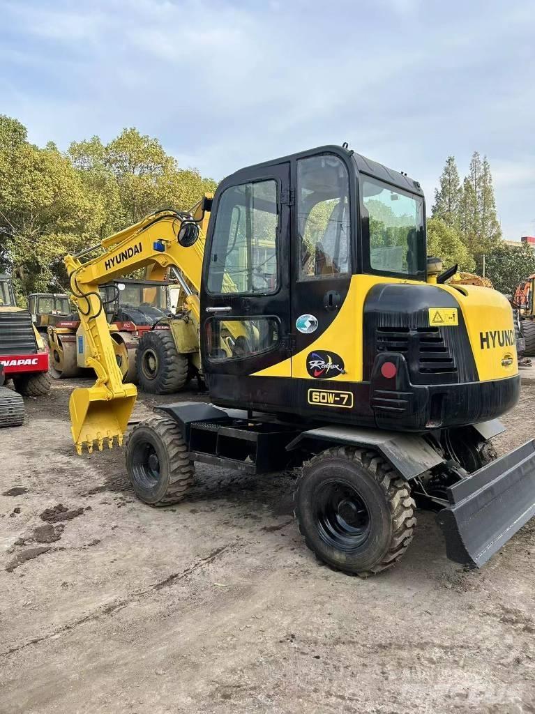 Hyundai R60-7 Колёсные экскаваторы