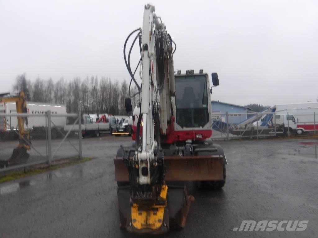Takeuchi TB 295 W Колёсные экскаваторы