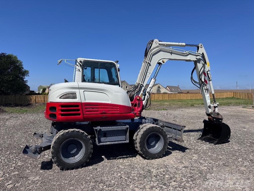 Takeuchi TB 295 W Колёсные экскаваторы