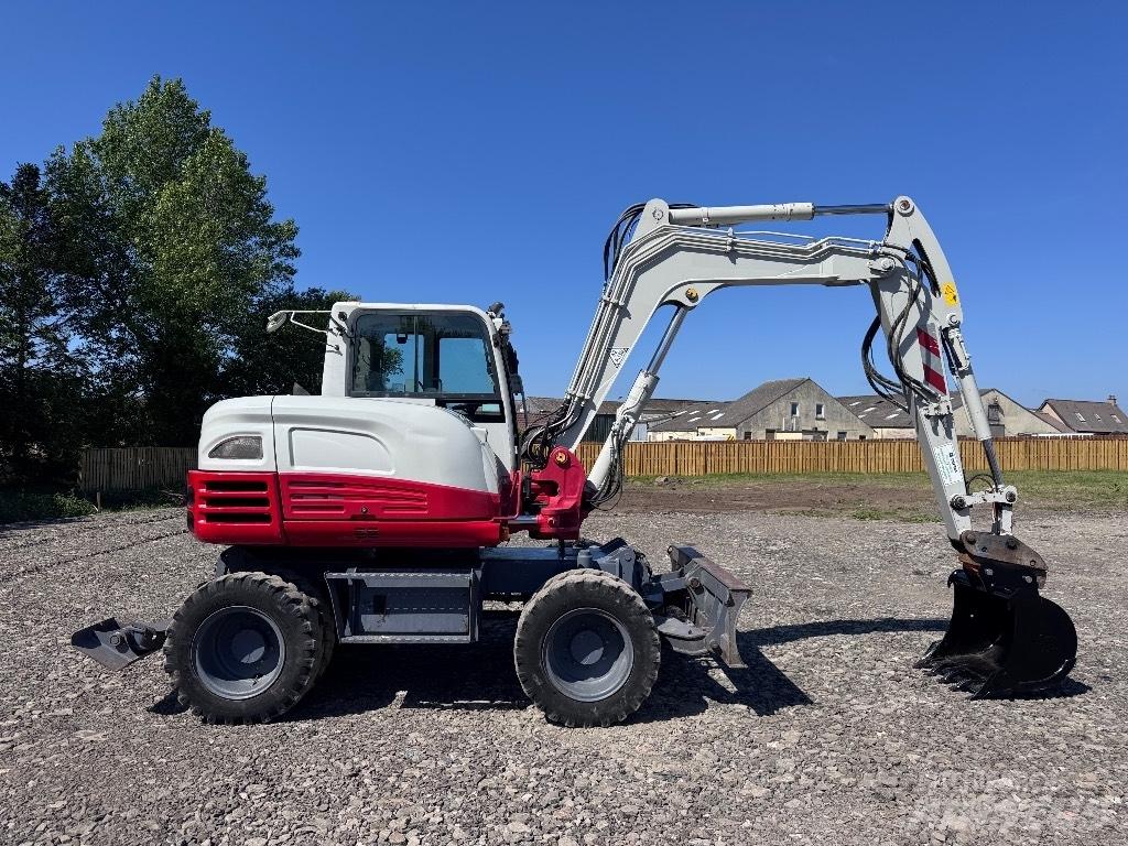 Takeuchi TB 295 W Колёсные экскаваторы