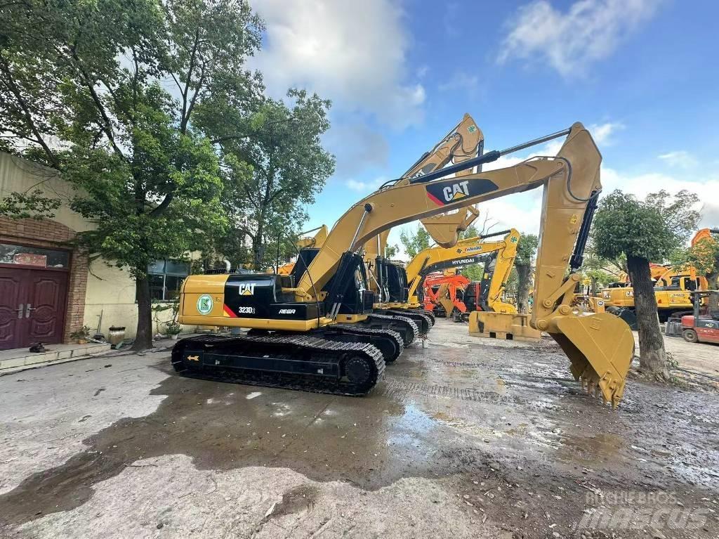 CAT 323 D Гусеничные экскаваторы