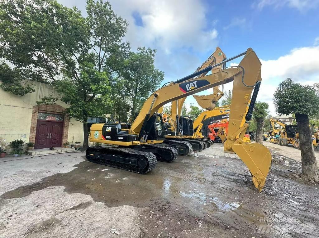 CAT 323 D Гусеничные экскаваторы