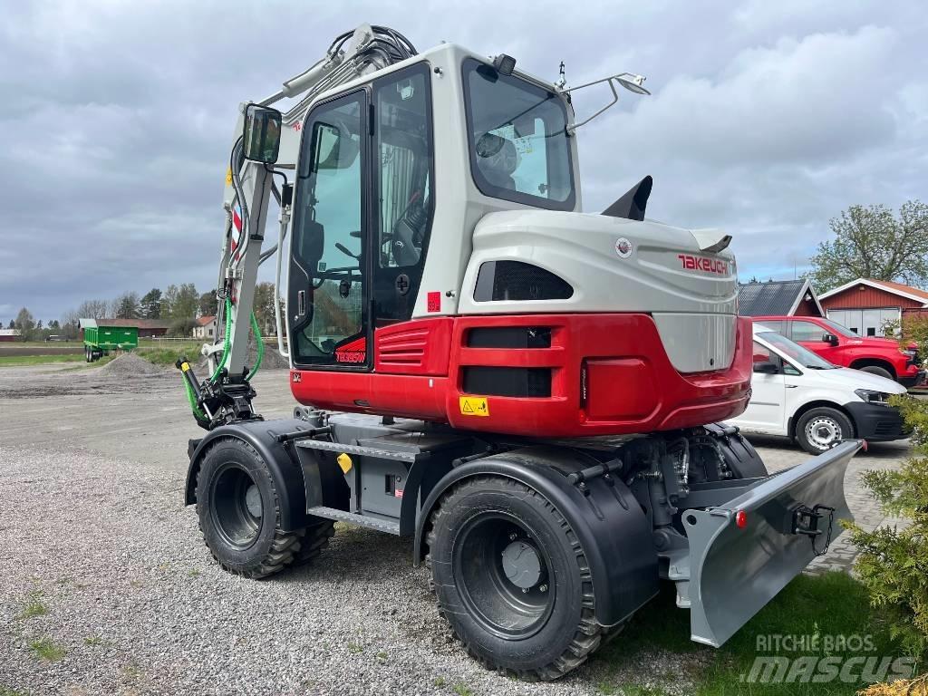 Takeuchi TB 395 W Колёсные экскаваторы