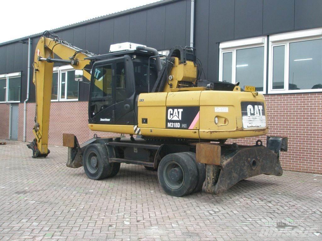 CAT M318D Колёсные экскаваторы