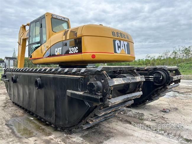 CAT 320 C Экскаваторы-амфибии