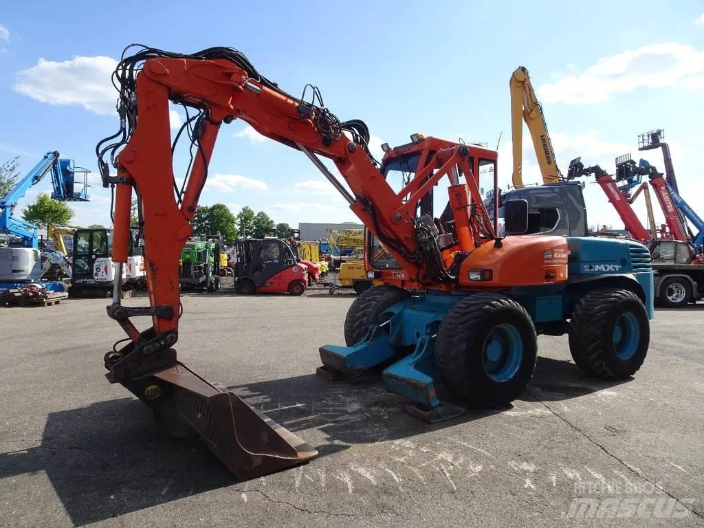 Mecalac 12MXT Колёсные экскаваторы