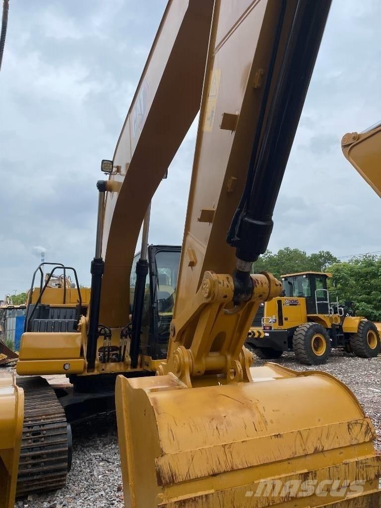 CAT 323GX Малые экскаваторы 7т-12т