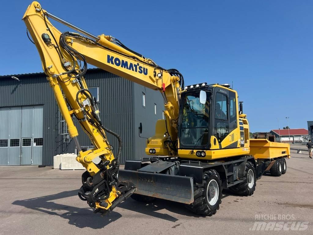 Komatsu PW148-11 Колёсные экскаваторы