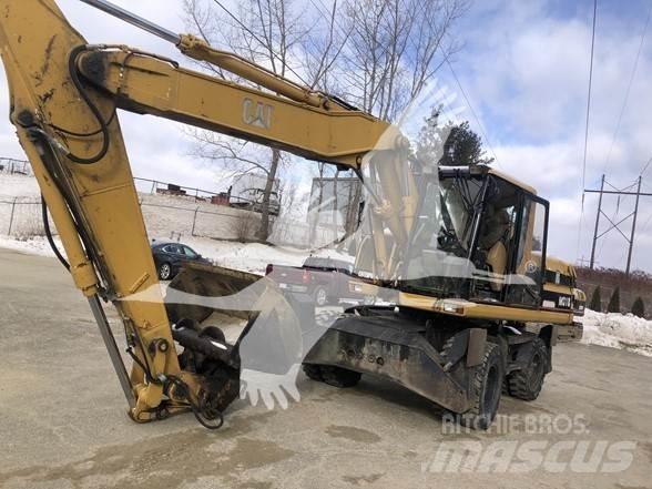 CAT M318 Колёсные экскаваторы