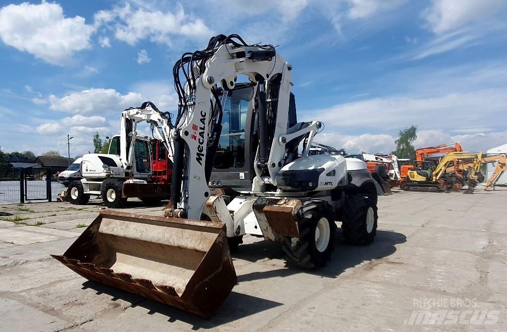 Mecalac 12 M TX Колёсные экскаваторы