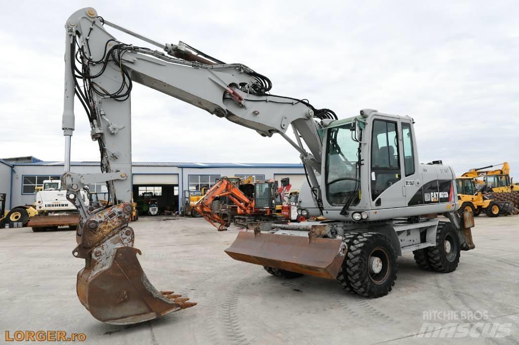 CAT M 313 D Колёсные экскаваторы