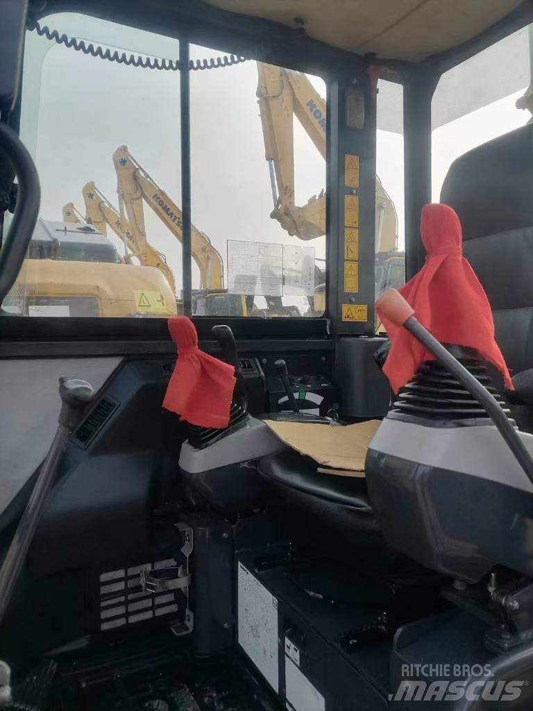 Komatsu PC56-7 Гусеничные экскаваторы