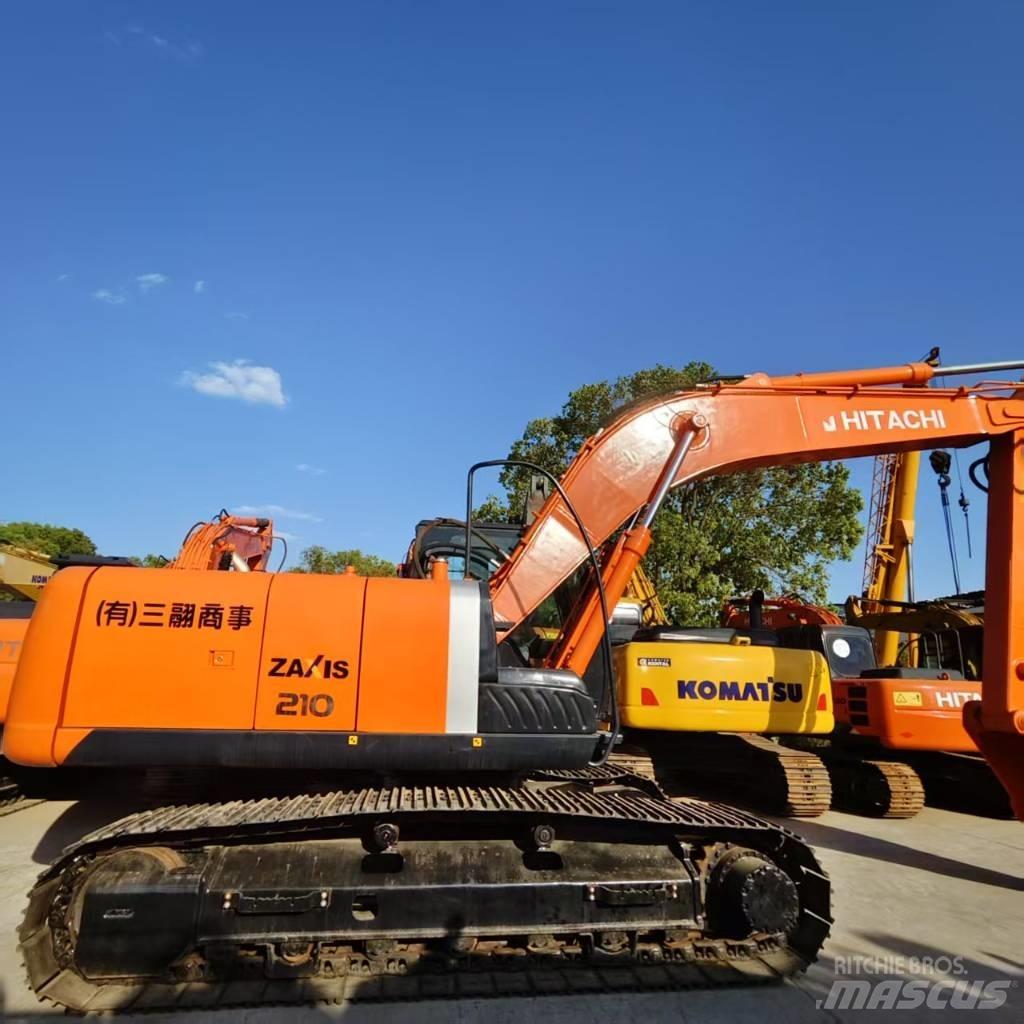 Hitachi ZX 210 Гусеничные экскаваторы