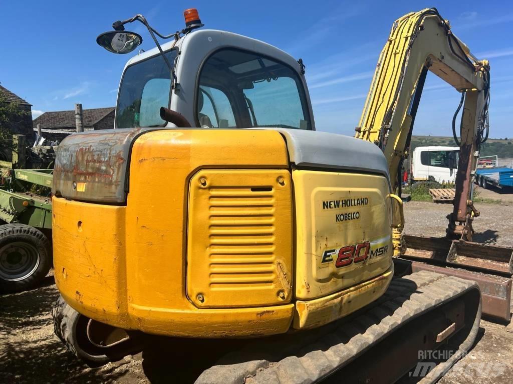 New Holland E 80 Малые экскаваторы 7т-12т