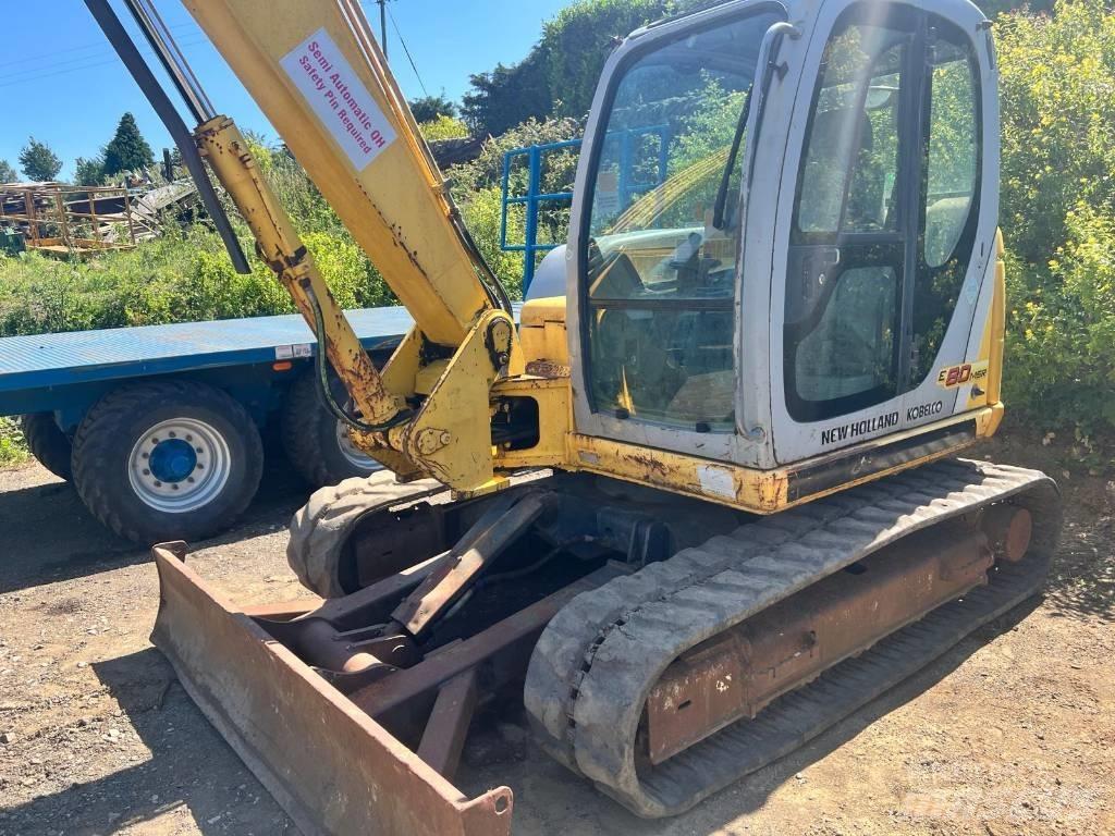 New Holland E 80 Малые экскаваторы 7т-12т
