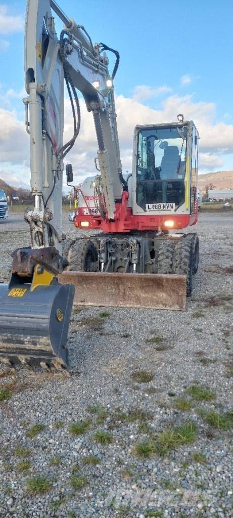 Takeuchi TB 295 W Колёсные экскаваторы