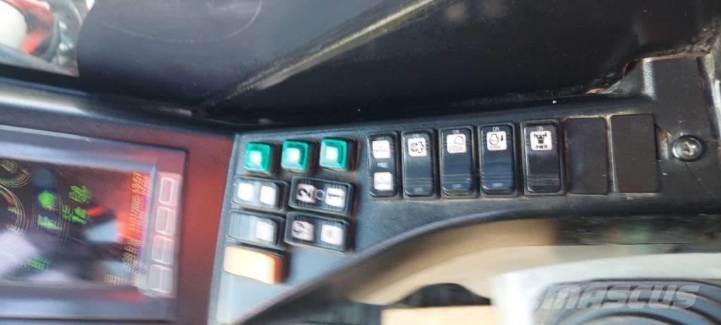 Takeuchi TB 295 W Колёсные экскаваторы