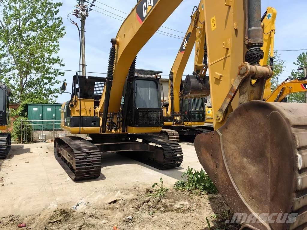 CAT 323 D Гусеничные экскаваторы