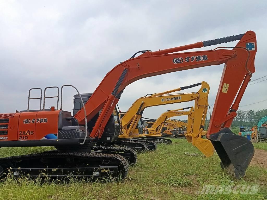 Hitachi ZX 210 Гусеничные экскаваторы