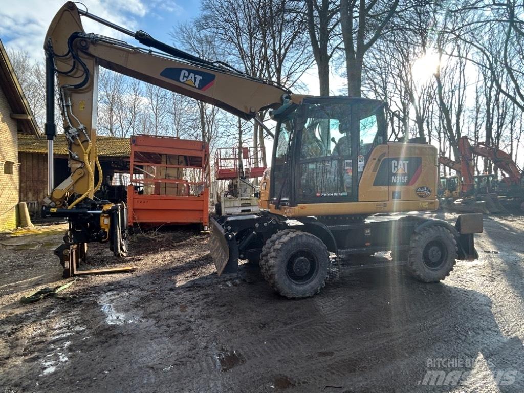 CAT M315 Колёсные экскаваторы