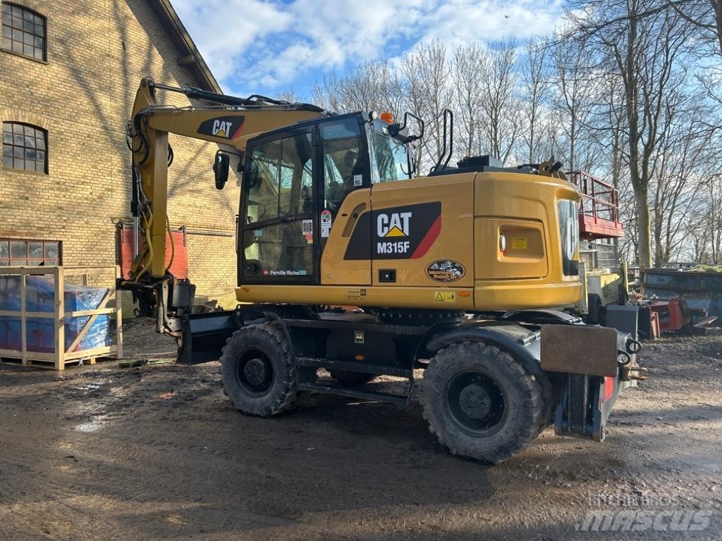 CAT M315 Колёсные экскаваторы