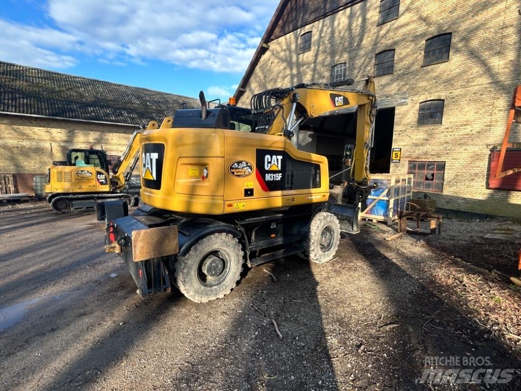 CAT M315 Колёсные экскаваторы