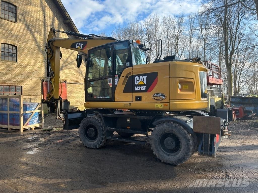 CAT M315F Колёсные экскаваторы