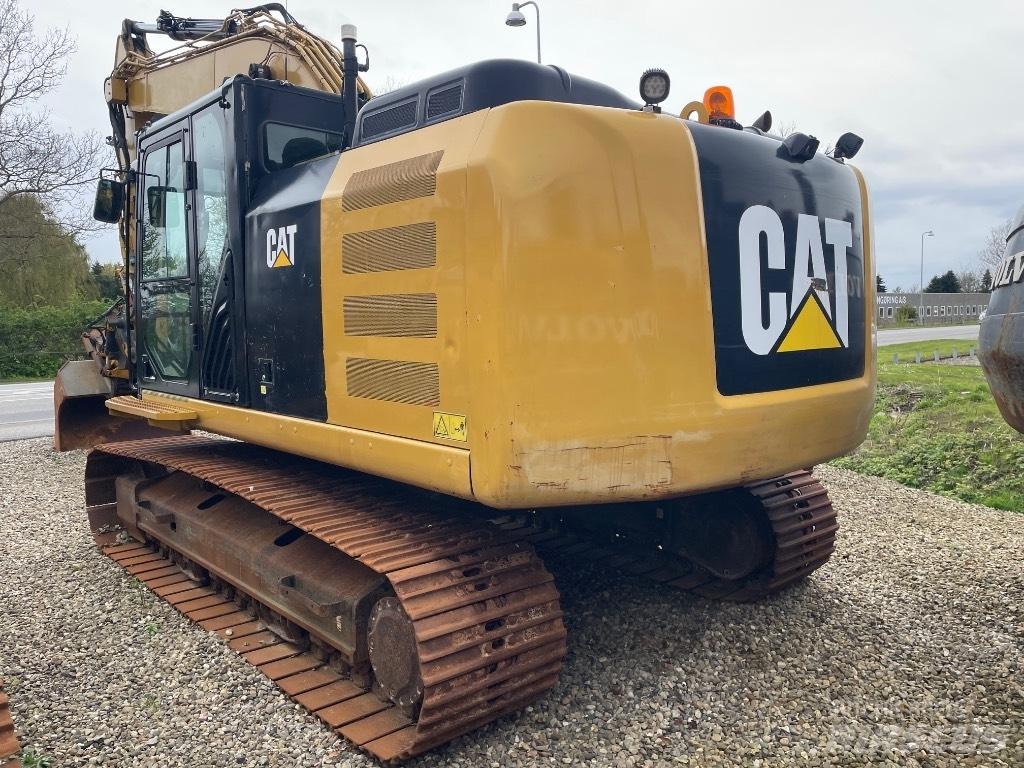 CAT 323FL Гусеничные экскаваторы
