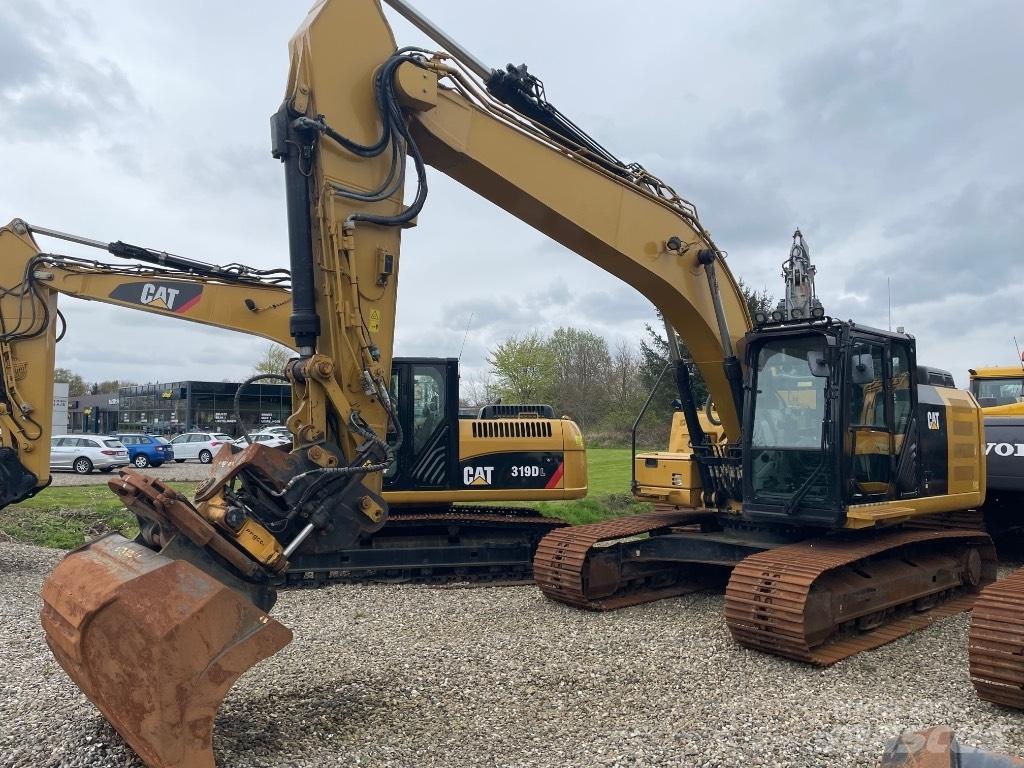 CAT 323FL Гусеничные экскаваторы