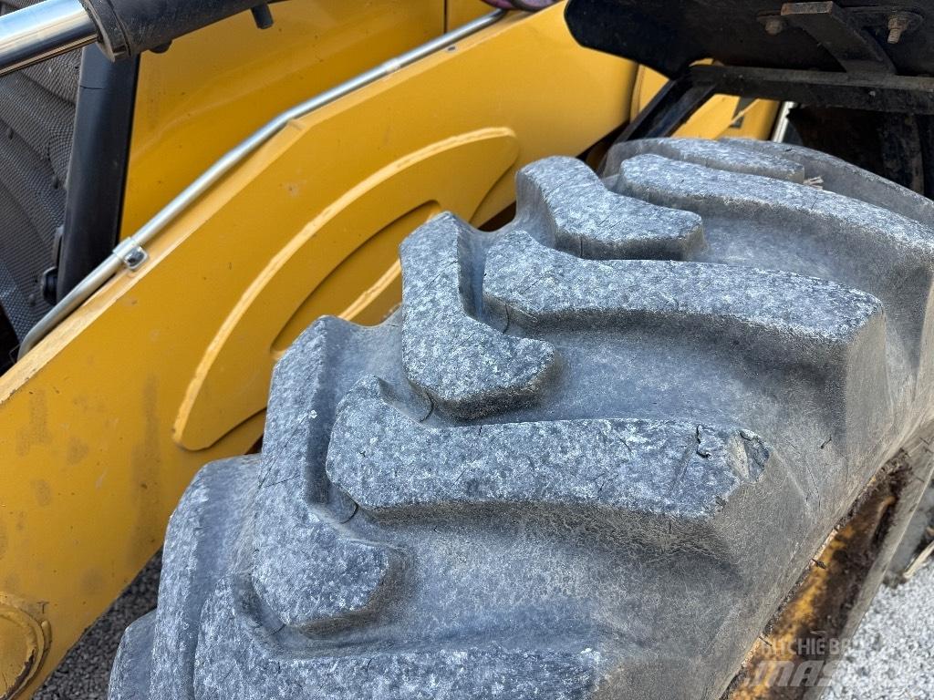 CAT 444 E Экскаваторы-погрузчики