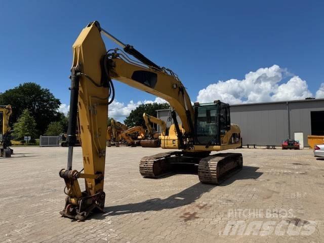 CAT 323 D L Гусеничные экскаваторы