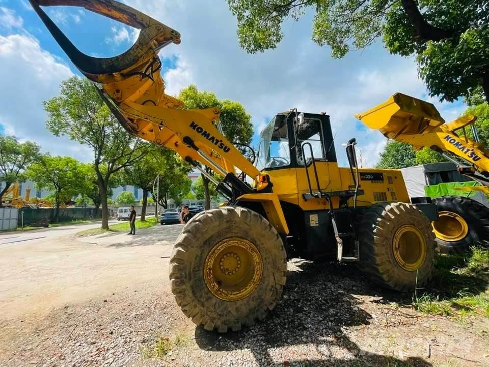 Komatsu WA320 Фронтальные погрузчики