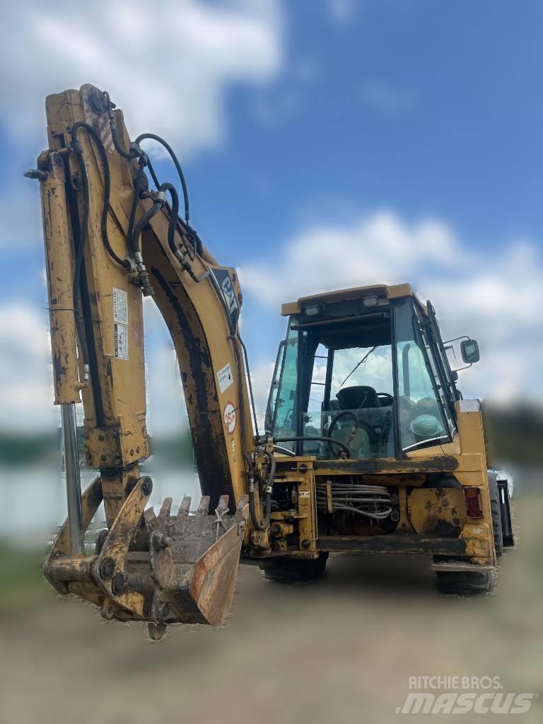CAT 428 Экскаваторы-погрузчики