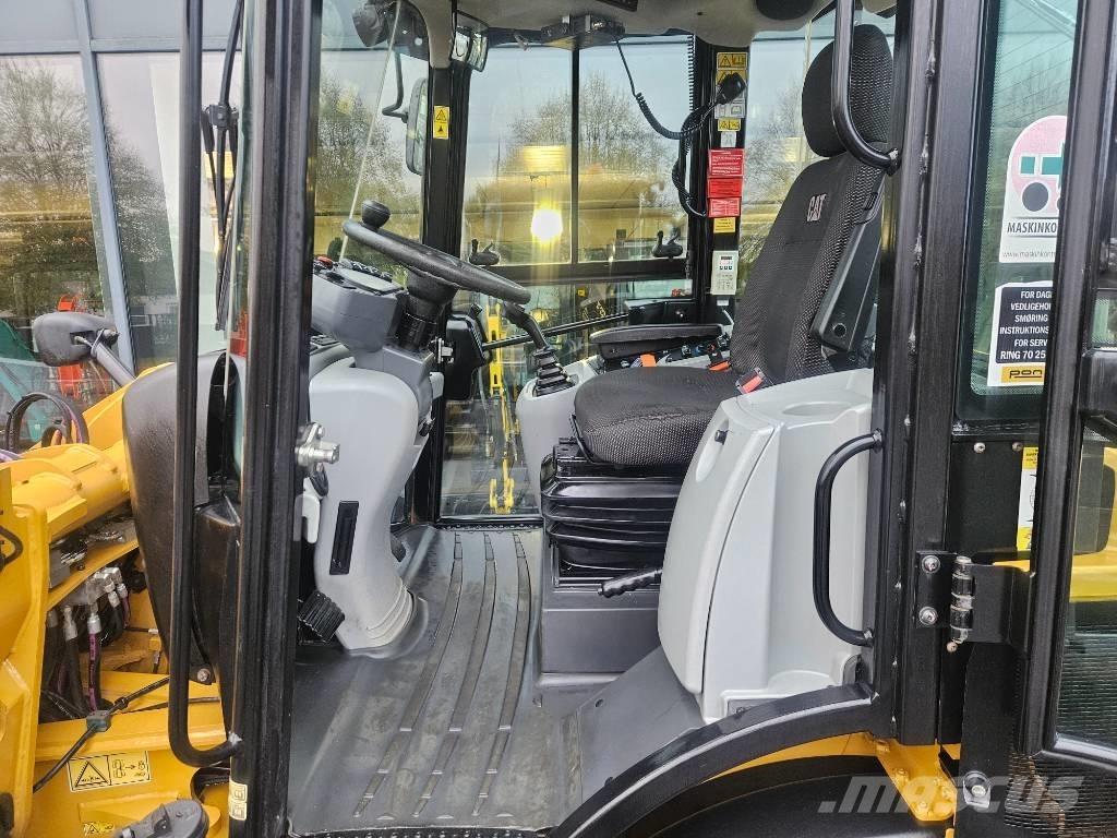 CAT 908m Фронтальные погрузчики