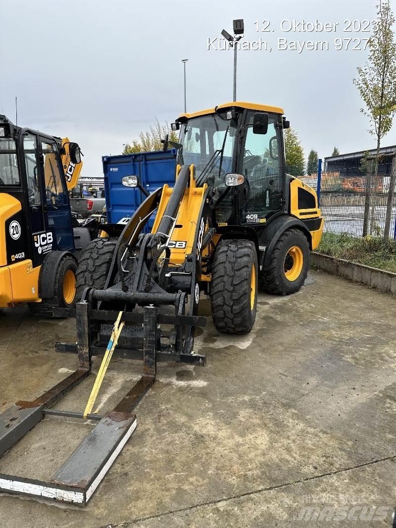 JCB 409 Фронтальные погрузчики