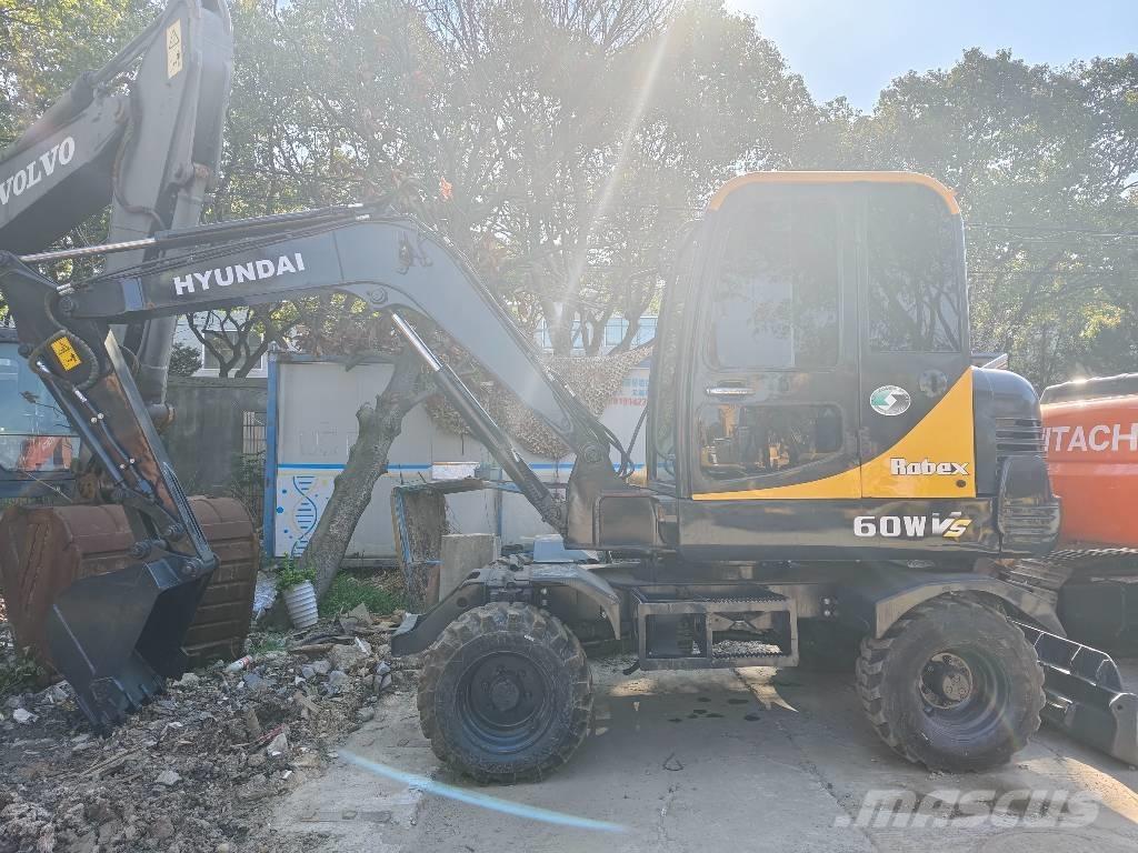 Hyundai 60 W VS Мини-экскаваторы