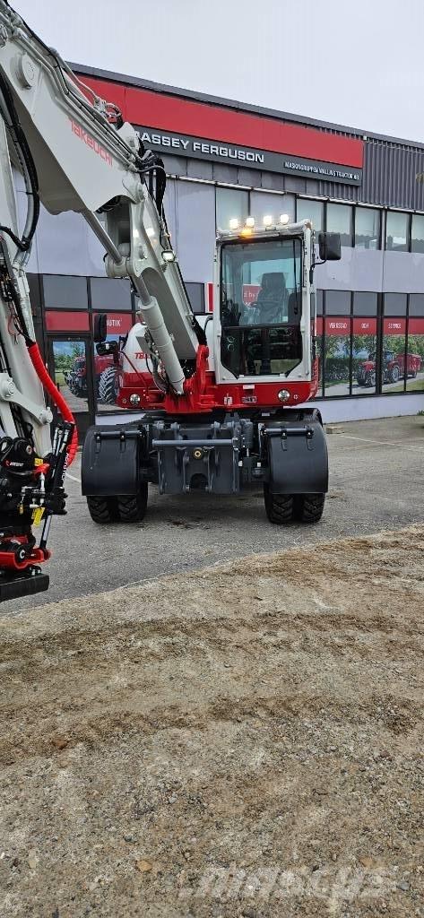 Takeuchi TB 395 W Колёсные экскаваторы
