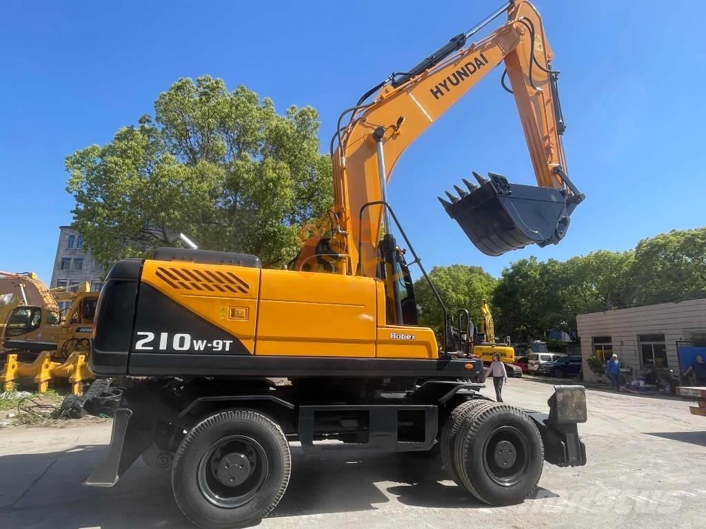 Hyundai 210W-9 Колёсные экскаваторы
