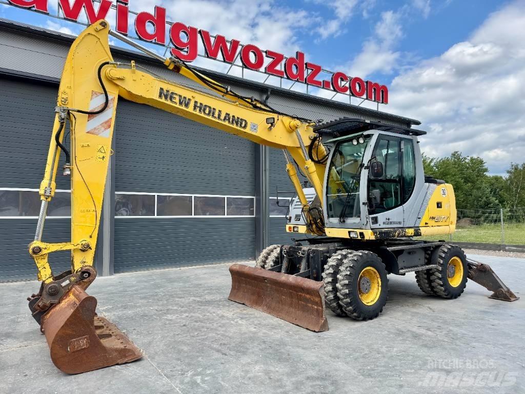 New Holland MH City Колёсные экскаваторы