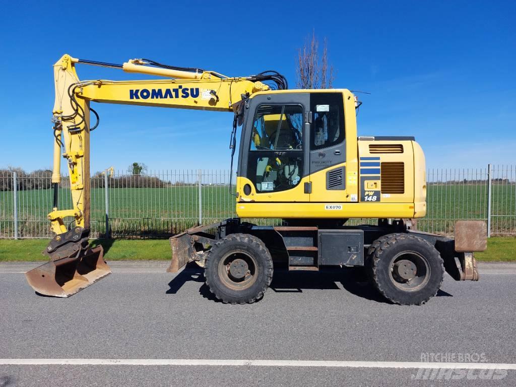 Komatsu PW148-10 Колёсные экскаваторы