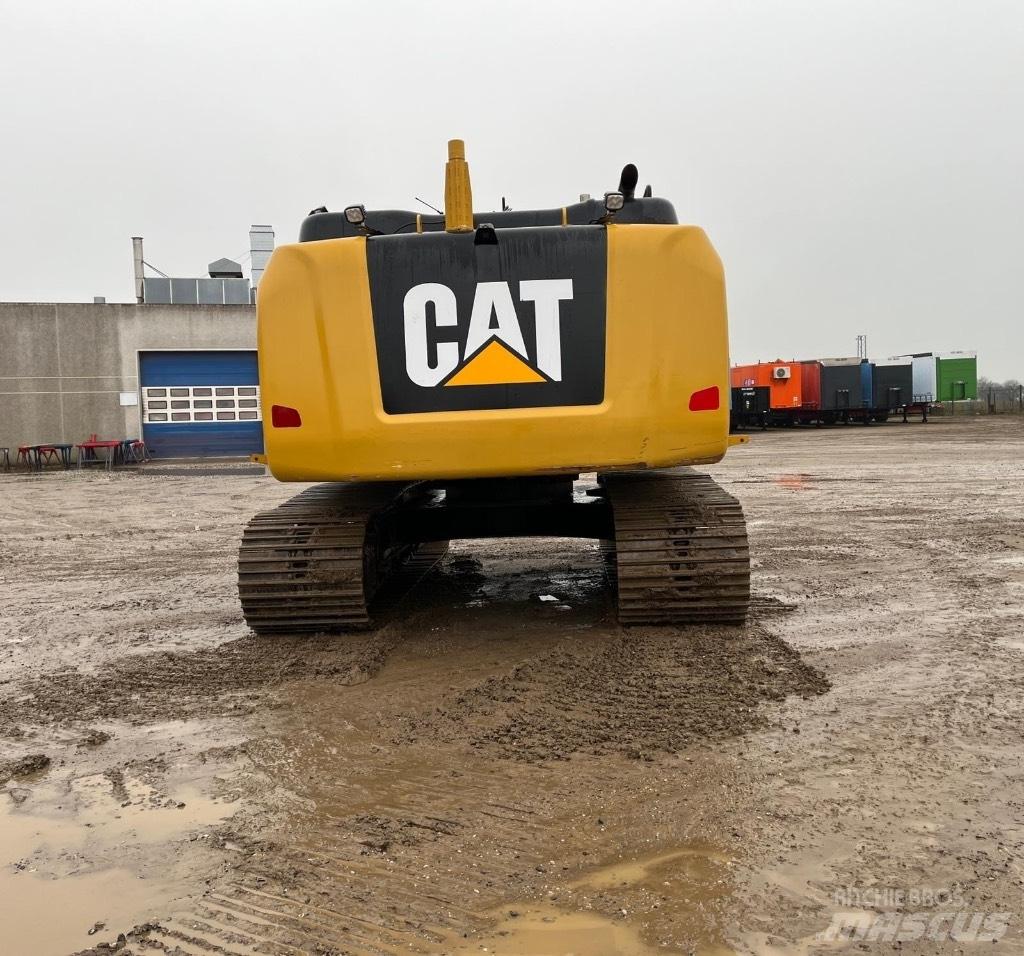 CAT 323 F L Гусеничные экскаваторы
